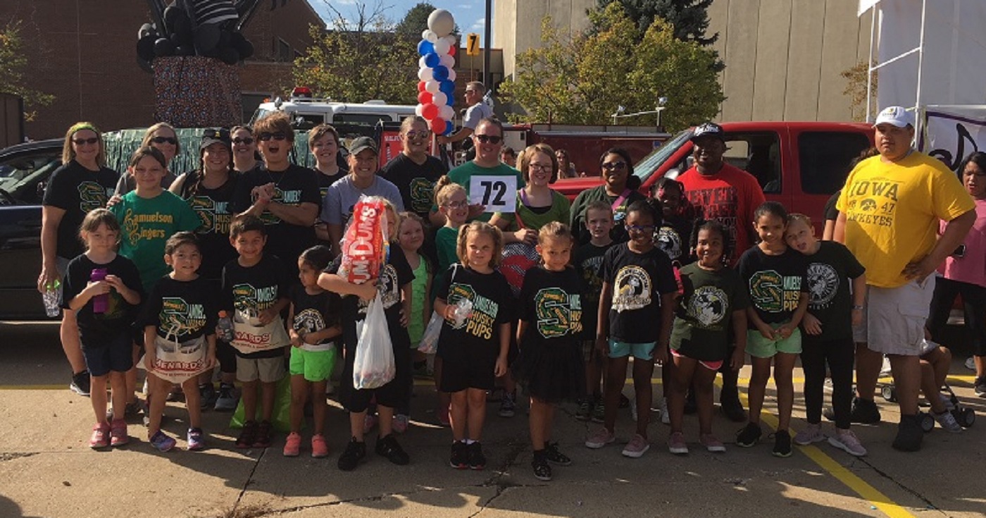 Samuelson students, parents, and staff at the Beaverdale Fall Festival Parade.