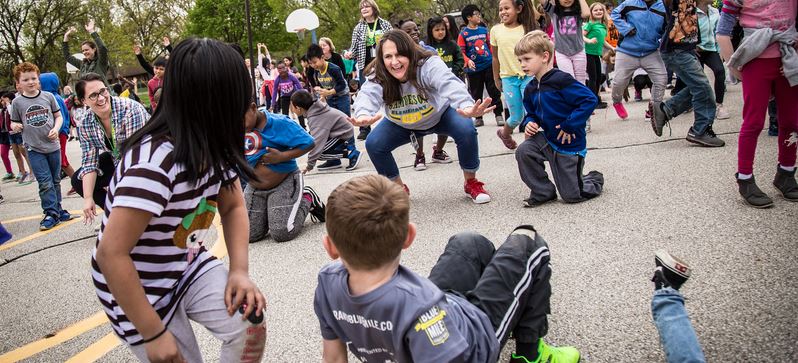 Samuelson staff and students dance to promote healthy choices for Go The Distance Day.