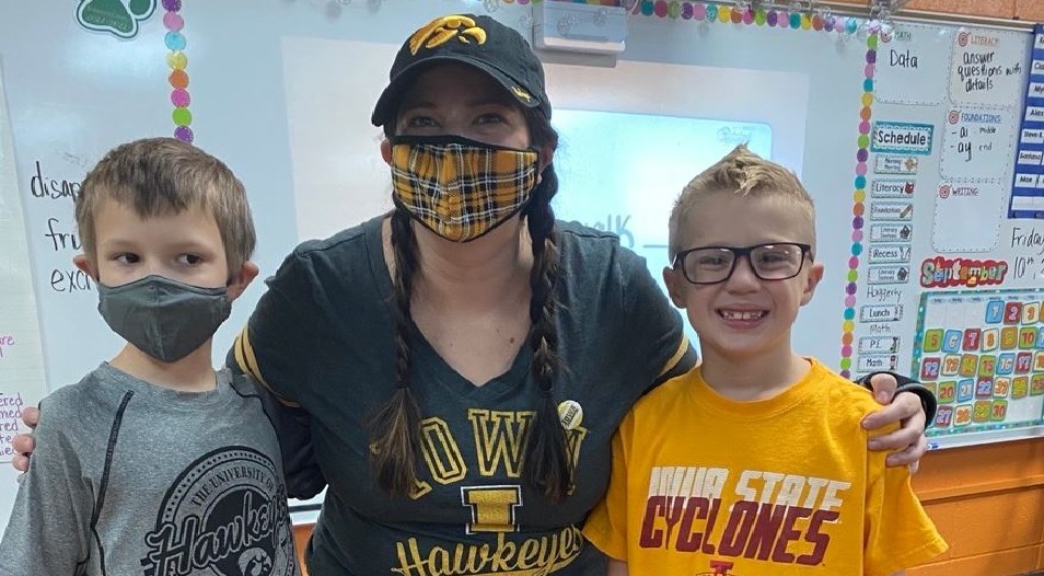 Mrs. Davidson and her students representing their favorite team!